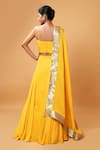 Shop_Quench A Thirst_Yellow Modal Silk Plain Scoop Neck Lehenga Set With Border Embroidered Dupatta _at_Aza_Fashions