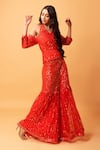 Quench A Thirst_Red Modal Net Embroidery Sequin Halter Neck Top And Sharara Set _Online_at_Aza_Fashions