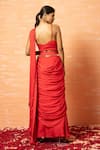 Shop_Quench A Thirst_Red Modal Silk Hand Work Cutdana Tassels V Neck Pre-stitched Saree With Blouse _at_Aza_Fashions