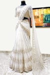 Buy_Riantas_White Net Round Embroidered Lehenga Saree With Blouse _at_Aza_Fashions