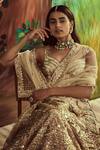 Shop_Angad Singh_Gold Net Glass Beads, Gota, Sequins, Metallic Embroidered Bridal Lehenga Set _Online_at_Aza_Fashions