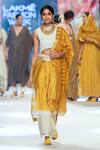 Buy_RE-_Yellow Degummed Silk Handwoven Round Arti Dip-dyed Lungi Set_at_Aza_Fashions