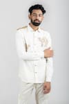 Runit Gupta_White Cotton Linen Thread Work Camel Embroidered Shirt_at_Aza_Fashions