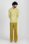 Runit Gupta_Yellow Enzyme Washed Cotton Plain Solid Box Pleat Pant  _Online_at_Aza_Fashions