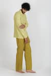 Buy_Runit Gupta_Yellow Enzyme Washed Cotton Plain Solid Box Pleat Pant  _Online_at_Aza_Fashions