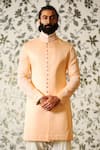 Buy Rohit Kamra Jaipur Peach Linen Silk Quilted Sherwani at Aza Fashions Buy_Rohit Kamra Jaipur_Peach Linen Silk Quilted Sherwani _at_Aza_Fashions