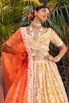 Buy_Riantas_Yellow Raw Silk Embroidery Sweetheart Neck Bridal Lehenga Set _Online_at_Aza_Fashions