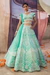 Buy_Riantas_Green Raw Silk Embroidery V Neck Bridal Lehenga Set  _at_Aza_Fashions