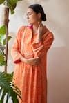 Rekha Agra_Orange Cotton Crepe Lotus Print Asymmetric Kaftan With Pant_Online_at_Aza_Fashions