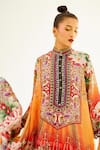 Rajdeep Ranawat_Orange Silk Printed Floral Band Collar Navya Draped Tunic _at_Aza_Fashions