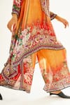 Rajdeep Ranawat_Orange Satin Printed Floral Permaz Pant  _at_Aza_Fashions