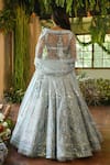 Shop_Reynu Taandon_Blue Net V Neck Iris Bridal Lehenga Set_at_Aza_Fashions