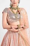 Rishi and Vibhuti_Peach Chanderi Embroidered Lehenga Set _at_Aza_Fashions