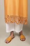 Ikshita Choudhary_Yellow Chanderi Silk Embroidered Floral Cutwork Round Kurta _at_Aza_Fashions