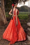 Shop_Aditi Gupta_Orange Lehenga Banarasi Silk Blouse Pure Silk Dupatta Shimmer Ikat Set _at_Aza_Fashions