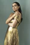 Shivani Awasty_Gold Lame Bandeau Pleated Metallic Gown  _at_Aza_Fashions