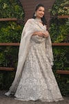 Buy_Pallavi Poddar_Ivory Organza Beads, Sequins Henna Crystal Embroidered Bridal Lehenga Set _at_Aza_Fashions