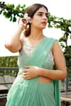 Surabhi Arya_Green Georgette Square Neck Pre-draped Saree With Blouse_at_Aza_Fashions