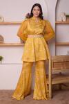 Buy_Surabhi Arya_Yellow Modal Satin Floral, Sequin And Beads Work Printed Tunic & Bell Bottoms Set_at_Aza_Fashions