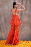 Shop_Silky Bindra_Orange Crepe Embroidered Mirror V Neck Peplum Kurta And Sharara Set _at_Aza_Fashions