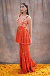 Buy_Silky Bindra_Orange Crepe Embroidered Mirror V Neck Peplum Kurta And Sharara Set _Online_at_Aza_Fashions