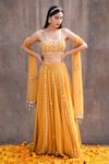 Silky Bindra_Yellow Net Embroidered Mirror Scoop Neck Embellished Bridal Lehenga Set _Online_at_Aza_Fashions