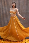 Buy_Silky Bindra_Yellow Net Embroidered Mirror Scoop Neck Embellished Bridal Lehenga Set _Online_at_Aza_Fashions