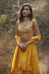Sana Barreja_Yellow Georgette Leaf Neck Naazia Tiered Lehenga Set _Online_at_Aza_Fashions