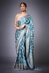 Buy RI.Ritu Kumar Blue Satin Printed Jasmine Saree With Unstitched Blouse Piece at Aza Fashions Buy_RI.Ritu Kumar_Blue Satin Printed Jasmine Saree With Unstitched Blouse Piece _at_Aza_Fashions