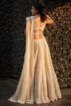 Shop_Seema Gujral_Gold Net Dupatta Tulle V Neck Bead Embellished Bridal Lehenga Set_at_Aza_Fashions