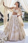 Shop_Seema Gujral_White Net Embroidered Floral Sweetheart Neck Bridal Lehenga Set  _at_Aza_Fashions