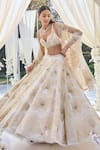 Seema Gujral_White Net Embroidered Floral Sweetheart Neck Bridal Lehenga Set  _Online_at_Aza_Fashions