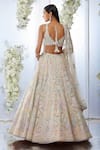 Shop_Seema Gujral_Beige Net Embroidered Floral Leaf Neck Bridal Lehenga Set _at_Aza_Fashions