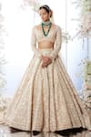 Buy_Seema Gujral_Gold Net Embroidered Floral Motifs Plunge Bridal Lehenga Set  _at_Aza_Fashions