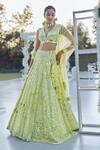 Buy_Seema Gujral_Yellow Net Mirror Embroidered Lehenga Set_at_Aza_Fashions