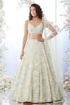 Buy_Seema Gujral_Beige Net Embroidered Sequins Plunge V Neck Floral Bridal Lehenga Set _at_Aza_Fashions