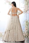 Shop_Seema Gujral_Beige Net Embroidered Sequin Plunge Floral Bridal Lehenga Set  _at_Aza_Fashions