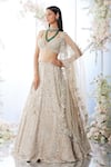 Seema Gujral_Beige Net Embroidered Sequin Plunge Floral Bridal Lehenga Set  _Online_at_Aza_Fashions