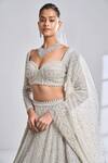 Seema Gujral_Silver Net Embroidery Sequin Sweetheart Neck Bridal Lehenga Set  _at_Aza_Fashions