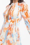 Shop_Mandira Wirk_Orange Chiffon Printed Tropical Motifs Round Dress _Online_at_Aza_Fashions