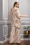 Shop_Sakshi Girri_Beige Crepe Floral One Shoulder Tunic And Sharara Set _at_Aza_Fashions