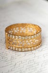 Buy_Osvag India_Gold Plated Diamonds, Cut Work Floral Motif Embellished Bangle _at_Aza_Fashions