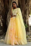 Shop_Surbhi Gupta_Yellow Organza Tie-dye Lehenga Set _at_Aza_Fashions