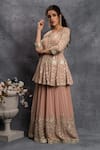 Shian_Peach Georgette Zardozi Round Dori Embroidered Peplum And Sharara Set _Online_at_Aza_Fashions