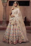 Shop_Show Shaa_Ivory Raw Embroidery Sequin Leaf Neck Floral Bridal Lehenga Set _Online_at_Aza_Fashions