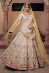 Show Shaa_Ivory Raw Embroidery Sequin Leaf Neck Floral Bridal Lehenga Set _at_Aza_Fashions