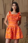 Buy_Shriya Som_Orange Silk Square Neck Pleated Peplum Dress_at_Aza_Fashions