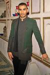 Buy_Sarab Khanijou_Green Sandwash Embroidered Bandhgala And Trouser Set_at_Aza_Fashions