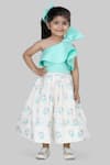 Buy_Shining Kanika_Blue Neoprene, Cotton Beads, Bows One Shoulder Crop Top And Skirt Set_at_Aza_Fashions