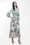 Mandira Wirk_Green Satin Printed Tropical Motifs One Shoulder Off Top And Wrap Skirt Set _Online_at_Aza_Fashions